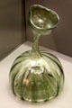 Narrow-necked green glass bottle found in Ulm at Ulmer Museum. Ulm, Germany.