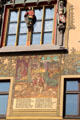 Carved figures on window of Ulm Rathaus. Ulm, Germany.