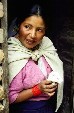 Woman holding a guinea pig in Weaving Village near Otavalo. Ecuador.
