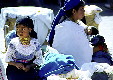 People of all ages attend the Otavalo market which is also a weekly social event. Ecuador.