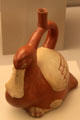 Moche ceramic stirrup-spout bottle in shape of duck from Peru at Museum of America. Madrid, Spain.