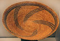 Chumash culture woven basket with spiral pattern from California at Museum of America. Madrid, Spain.