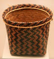 Native woven square to round transition basket with geometric pattern from North America at Museum of America. Madrid, Spain.