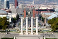 Plaça d'Espanya with exposition buildings, columns, fountain & Venetian towers. Barcelona, Spain