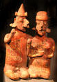 Funerary ceramic couple statue from Nayarit, Mexico at Barbier Mueller Precolumbian Art Museum. Barcelona, Spain.