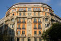 Typical corner building in Eixample district at Rambla de Catalunya 105 at Carrer de Provença. Barcelona, Spain