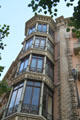 Facade details of corner building at Rambla de Catalunya 86. Barcelona, Spain.