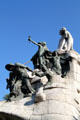 Nationalist grouping atop monument to Doctor Bartomeu Robert by Josep Llimona on Gran Via. Barcelona, Spain.