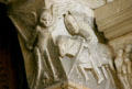 Detail of pilgrim on horse to right of tympanum of Cathedral St. Lazarre. Autun, France.