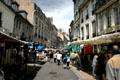 Market along Grande Rue. Besançon, France.