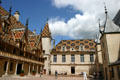 St Louis wing in courtyard of Hotel Dieu. Beaune, France.