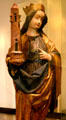 Wooden statue of St Barbara with her tower from upper Rhine in Unterlinden Museum. Colmar, France