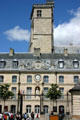 Medieval Tower of Philippe-le-Bon rises behind Court of Honor of Palace of Dukes of Burgundy. Dijon, France.