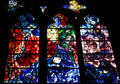 Red, blue, purple series of three stained-glass windows by Marc Chagall in Cathedral. Metz, France.
