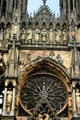 Facade side of rose window on Cathedral which has been rebuilt since total destruction in World War I. Reims, France.