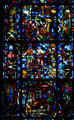 Champagne production stained glass window by Jacques Simon in Cathedral. Reims, France.
