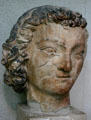 Sculpted head of St Jean from Cathedral in Tau Palace. Reims, France.