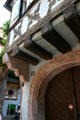 Carved arches & timbers on house. Riquewihr, France.