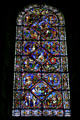 Stained glass window of St. Stephen's Cathedral with Biblical stories. Sens, France.