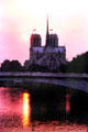 Notre Dame Cathedral over Seine at sunset. Paris, France