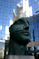 Tindaro face sculpture by Igor Mitoraj at Belvédère building at La Défense. Paris, France.