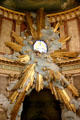 Sunburst with angels Baroque artwork in St Roch Church. Paris, France.