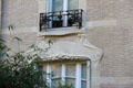 Art Nouveau window surround at Villa Deron-Levent. Paris, France.