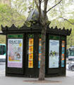 Classic newspaper vendor's kiosk on Paris street date back to 19thC. Paris, France.