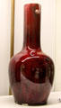 Porcelain bottle enamelled flaming red color by Havilland Workshop of Paris at Museum of Decorative Arts. Paris, France.