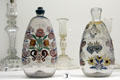 French glass flagons & glass candlesticks at Museum of Decorative Arts. Paris, France.