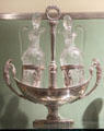 Oil & vinegar cruets on silver stand in form of boat from Paris at Museum of Decorative Arts. Paris, France.