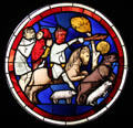 Job's trial of loss of flocks stained glass window from Sainte-Chapelle in Paris at Cluny Museum. Paris, France.