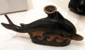 Vase in form of dolphin from Apulia, Italy at Petit Palace Museum. Paris, France.