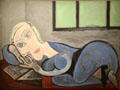 woman reading while reclining painting by Pablo Picasso at Picasso Museum. Paris, France.