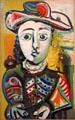 Young woman seated painting by Pablo Picasso at Picasso Museum. Paris, France.