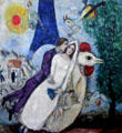 Married couple at Eiffel Tower abstract painting by Marc Chagall at Georges Pompidou Center. Paris, France.