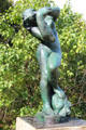 Bronze sculpture of nude female by Auguste Rodin at Rodin Museum Garden. Paris, France.