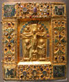 Bejeweled binding box for manuscript with crucifixion & symbols of evangelists from Germany at Louvre Museum. Paris, France.