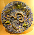 Ceramic plate with moulded snake, crayfish & frogs by Agostine Conrado from Nevers, France at Sèvres National Ceramic Museum. Paris, France.