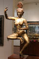 Gilded copper statue of dancer from Tibet at Guimet Museum. Paris, France.