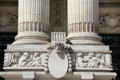 Frieze under columns of Grand Palais. Paris, France.