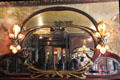 Maxim's Restaurant Art Nouveau mirror & lily lamps. Paris, France.