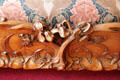 Detail of carved bedstead footboard at Maxim's Art Nouveau Collection 1900. Paris, France.