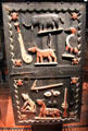 Carved wooden gate of royal palace of king of Glèlè from Abomey, Benin at Musée du quai Branly. Paris, France