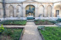 Courtyard of Carnavalet Museum with statue of Louis XIV. Paris, France.