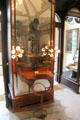 Art Nouveau style table, lighting & mirror in Boutique Fouquet at Carnavalet Museum. Paris, France.