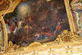 Ceiling painting by Charles Le Brun in Hall of Mirrors at Versailles Palace. Versailles, France.