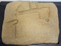Engraved symbols on Great Broken Menhir displayed at Locmariaquer Megalithic site. Locmariaquer, France.