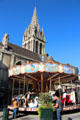 Carrousel in front of St Sauveur church. Caen, France.
