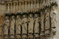 Saints carved to right of central portal of Amiens Cathedral. Amiens, France.